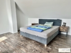 Nahe Korneuburg! Sonnige 4-Zimmer-Dachgeschoss-Wohnung mit Panorama-Terrasse und Stellplatz - Bild