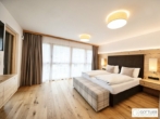 Bestlage Pinzgau mit ca. 5% Rendite! Sonniges 5-Zimmer-Penthouse mit Loggia sowie beheiztem Aussenpool - Bild