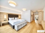 Bestlage Pinzgau mit ca. 5% Rendite! Sonniges 5-Zimmer-Penthouse mit Loggia sowie beheiztem Aussenpool - Bild